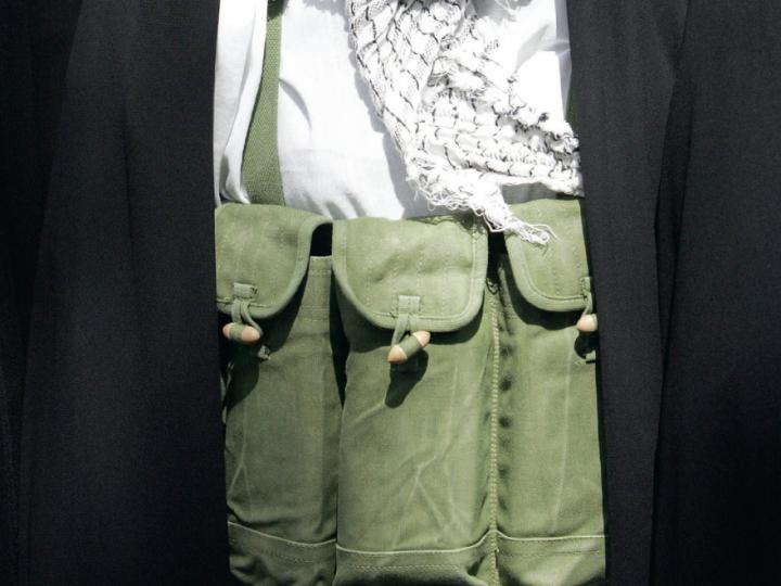 Person with bomb-like materials strapped around the body
