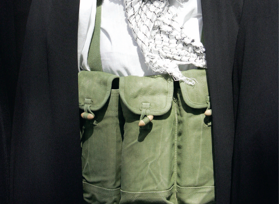 Person with bomb-like materials strapped around the body