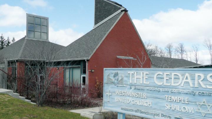 Red building that is United Church and Jewish temple