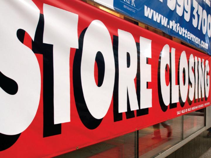 Sign reading "store closing"