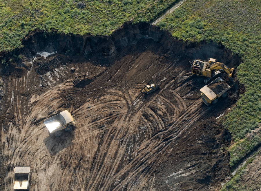 Overhead shot of mining operation cut out of landscape