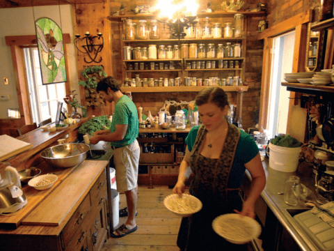 White couple in their kitchen, cooking