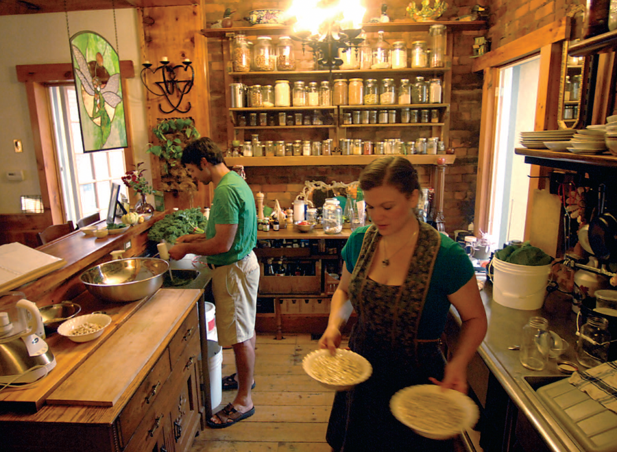 White couple in their kitchen, cooking