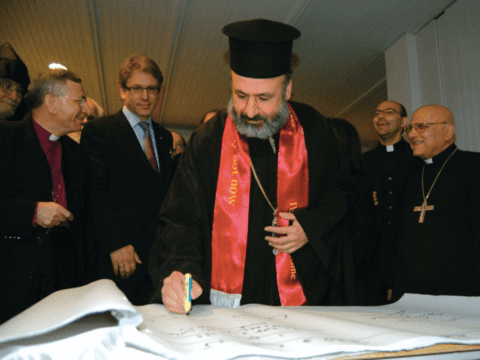 Church leaders signing document