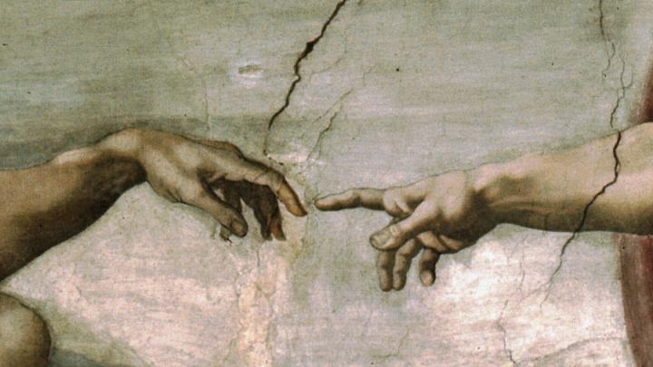 Michelangelo's fresco of God's finger creating Adam