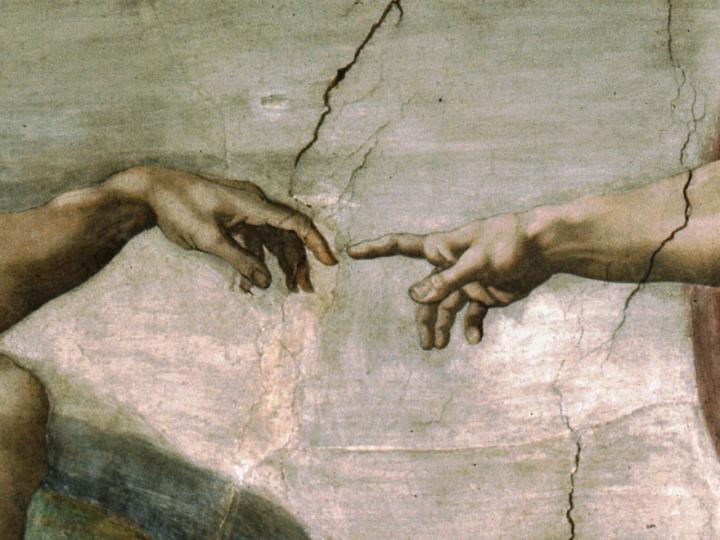 Michelangelo's fresco of God's finger creating Adam