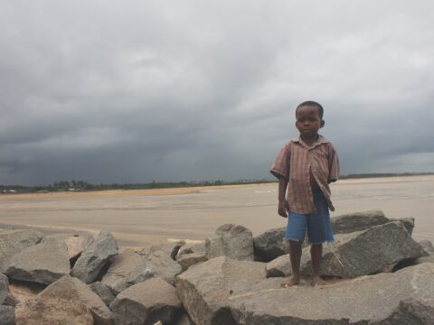 small boy on beach in Ghana