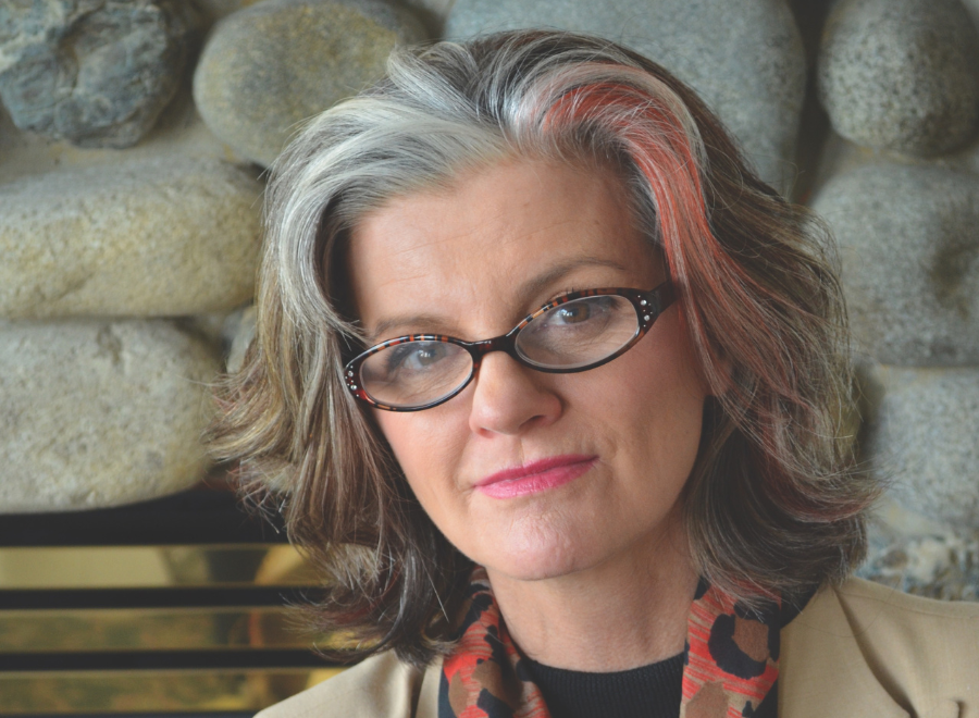 photo of woman looking into camera