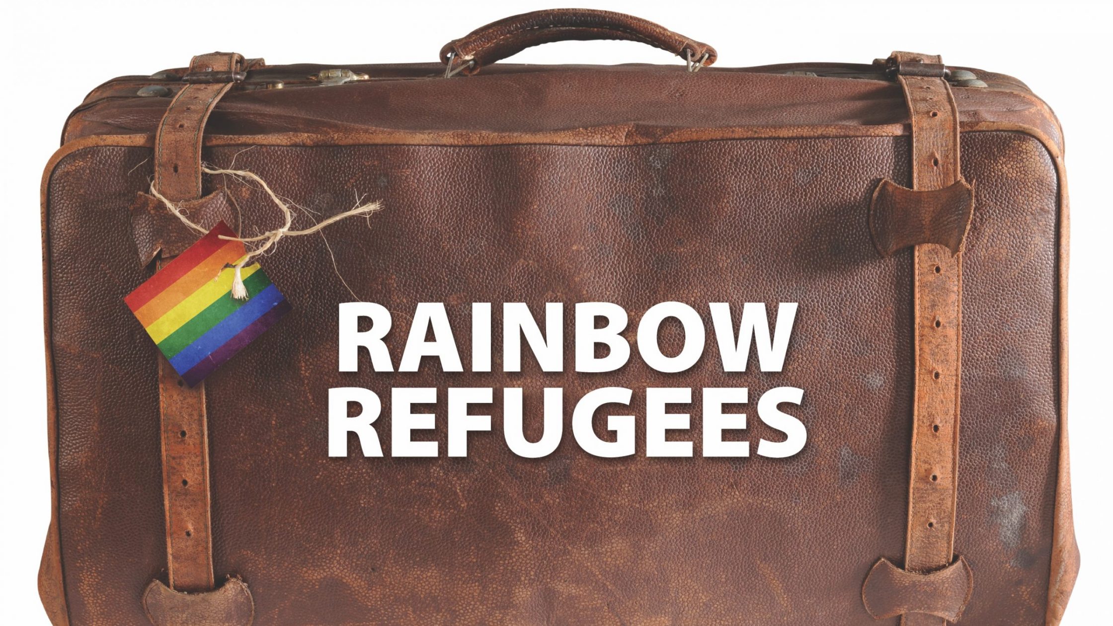 leather suitcase with rainbow refugees label