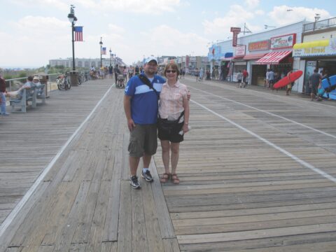 mother and son on boardwalk