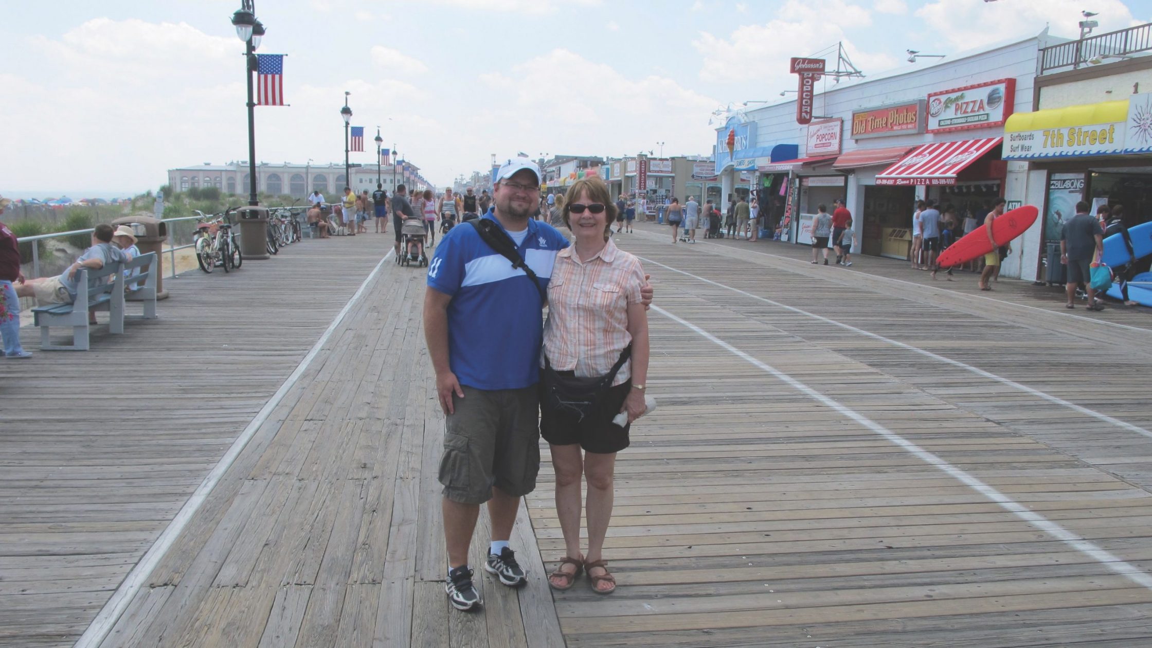 mother and son on boardwalk