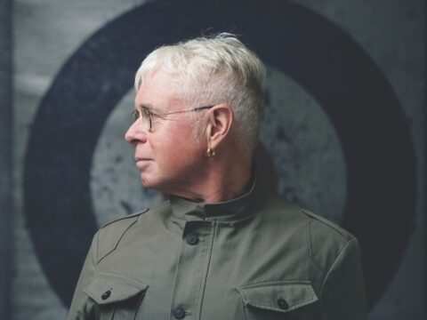 photo of white-haired man in profile
