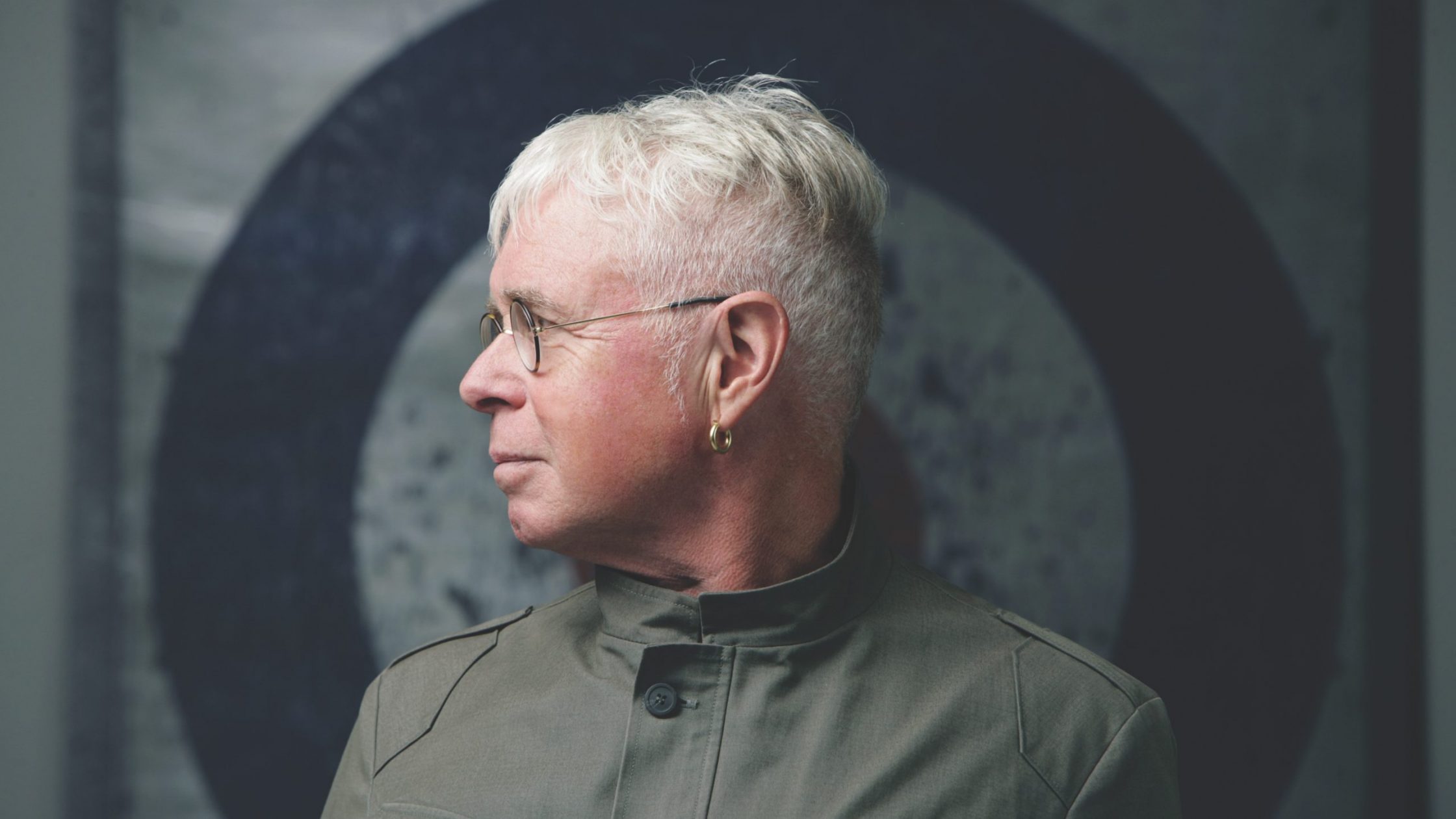 photo of white-haired man in profile