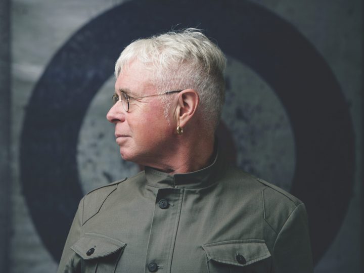 photo of white-haired man in profile