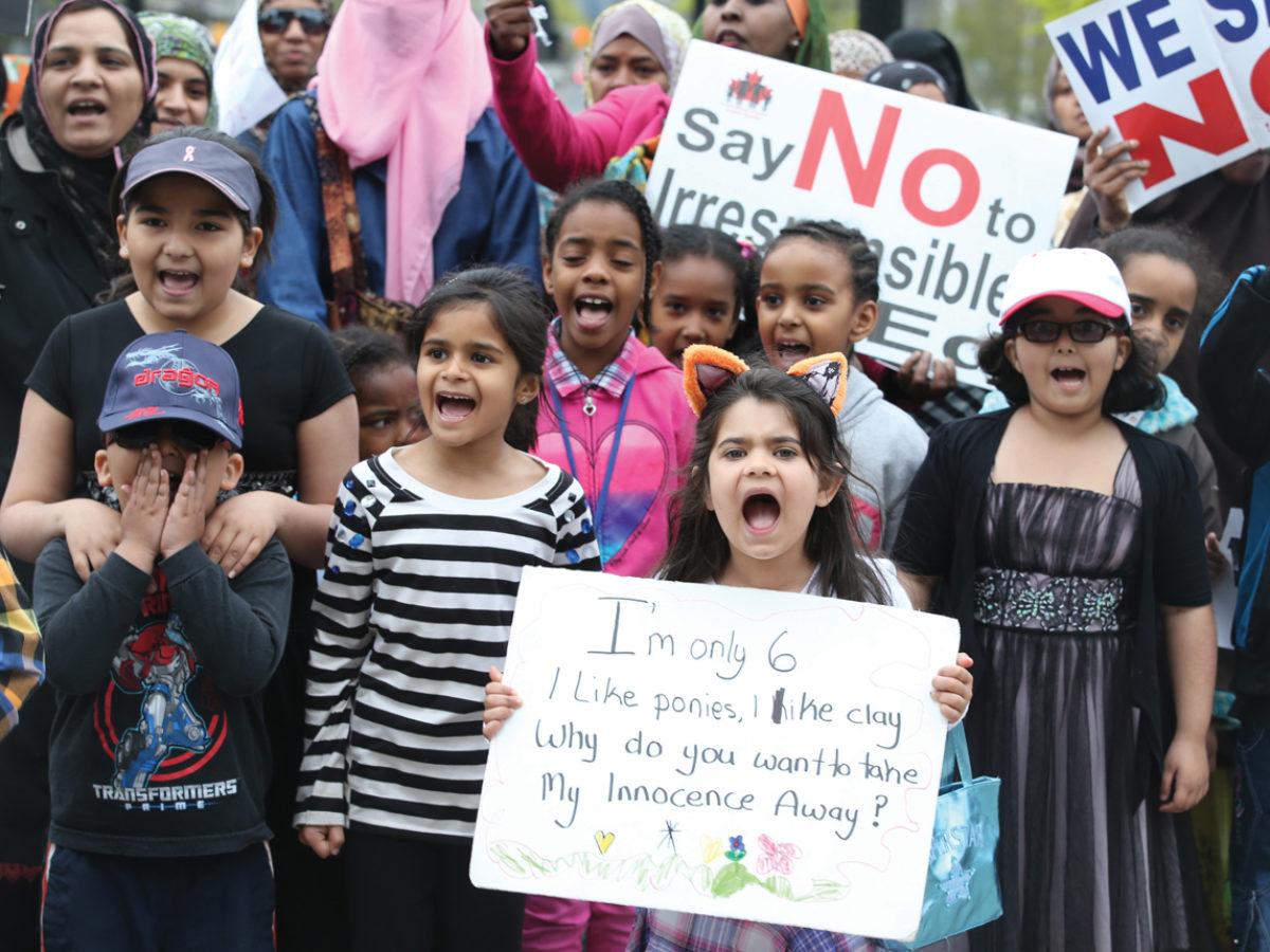 Children and their parents protest Ontario’s new sex-ed curriculum at Queen’s Park in Toronto last May. Photo by Vince Talotta/Toronto Star via Getty Images