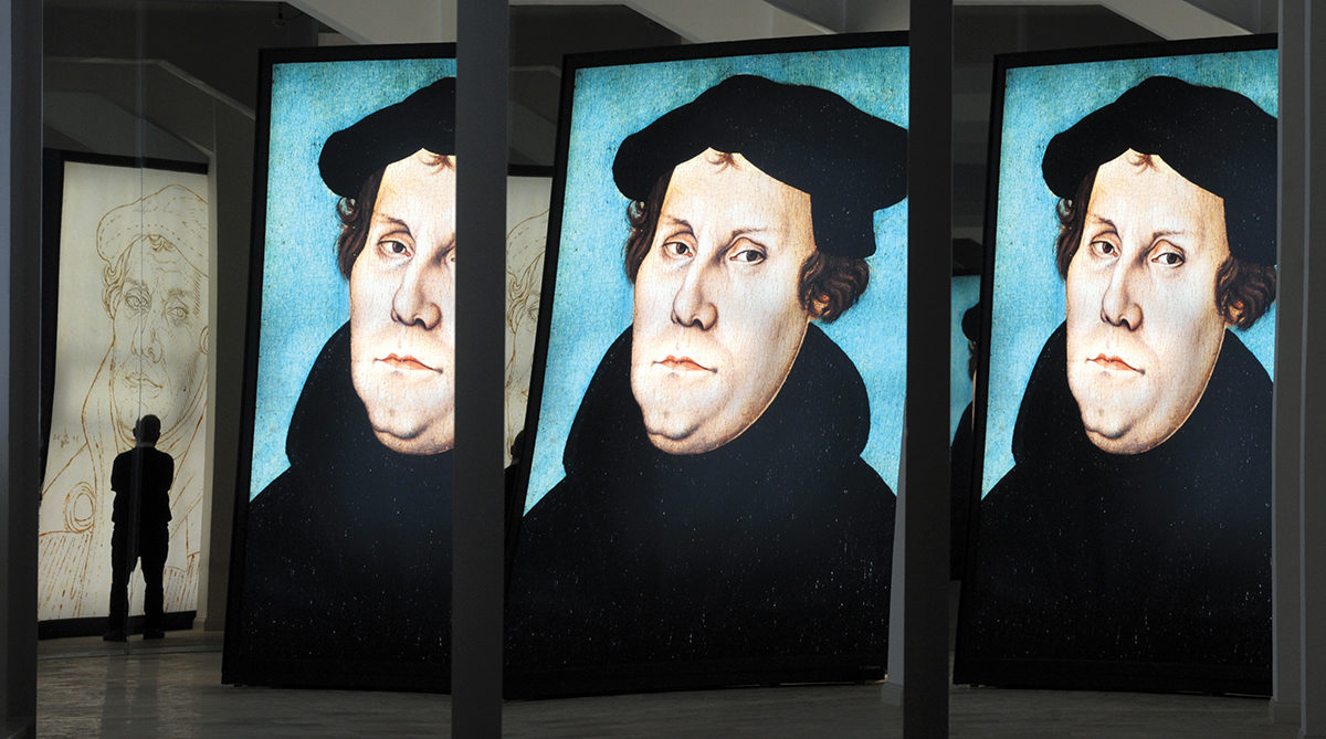 Images of Martin Luther at an exhibition in Halle, Germany, in 2008. Photo by picture alliance/ZB/Peter Endig