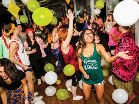 Balloons fill the air at a morning Daybreaker rave in Toronto. Photo courtesy of daybreaker.com