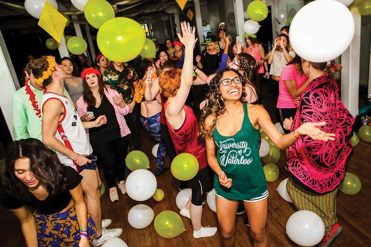 Balloons fill the air at a morning Daybreaker rave in Toronto. Photo courtesy of daybreaker.com