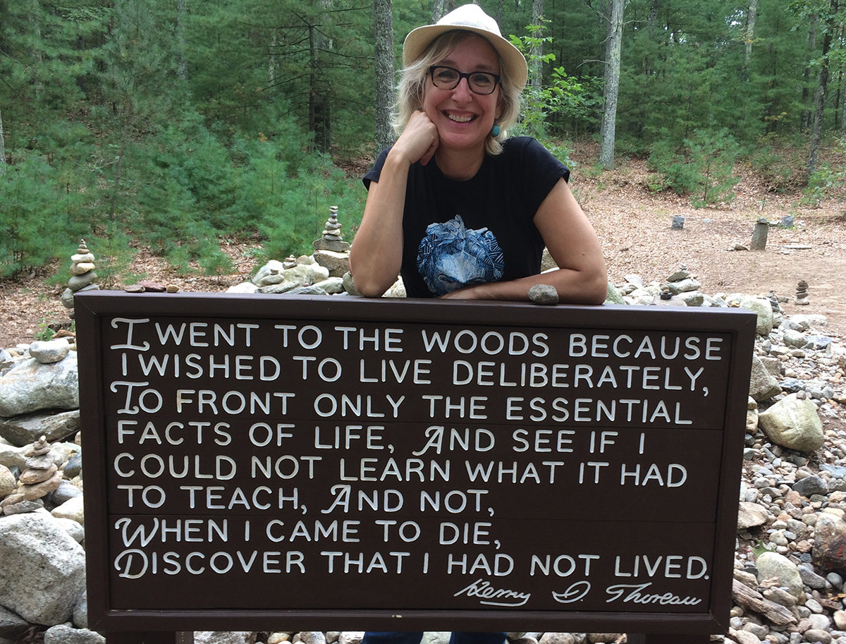 Like many pilgrims, writer Anne Bokma placed a stone at a memorial cairn of rocks near the original site where Thoreau built his cabin. Photo courtesy of Anne Bokma