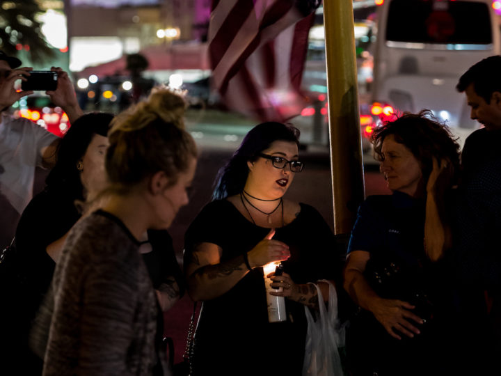 Mourners light candles and leave flowers at the Route 91 Harvest Festival shooting victims memorial in Las Vegas, on Oct. 6, 2017. Photo by Gian Sapienza/iStock