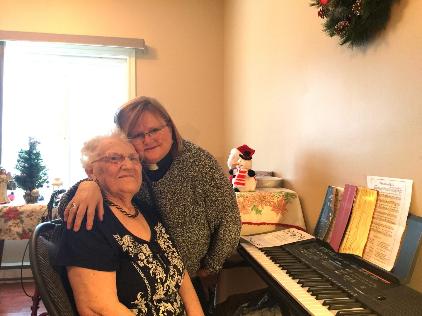 Church organist Louise Pelley (left) with minister Wendy Lowden. Photo: Courtesy of Wendy Lowden