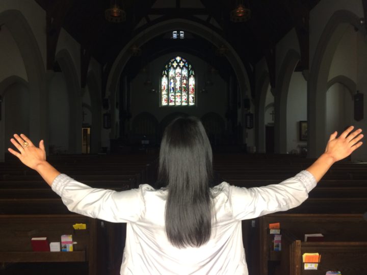 Writer Jenna Tenn-Yuk in a church. She thinks Christian communities miss out on the perspectives of LGBTQ+ people when they put in policies that discriminate against them. (Credit: Michael Vidler)