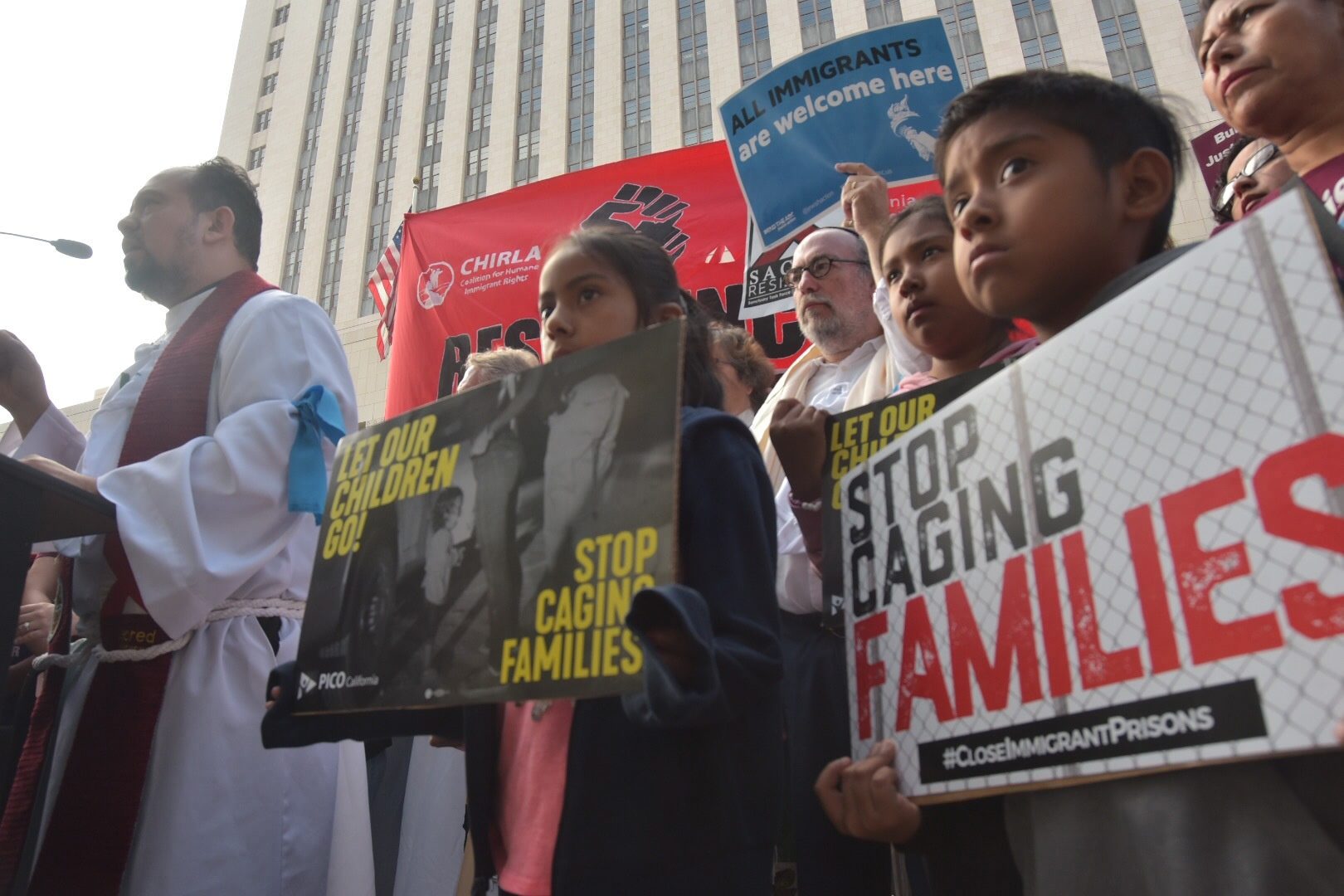 Protesters in Los Angeles demonstrate in June against Attorney General Jeff Sessions, denouncing his defence of the “zero-tolerance” border policy. (Credit: Francisco Lozano/CrowdSpark/The Canadian Press)