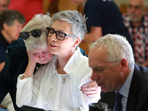 Rev. Gretta Vosper, centre, could be effectively fired from her job at West Hill United in Toronto following the results of a hearing later this fall. (Photo: Hugh Wesley)
