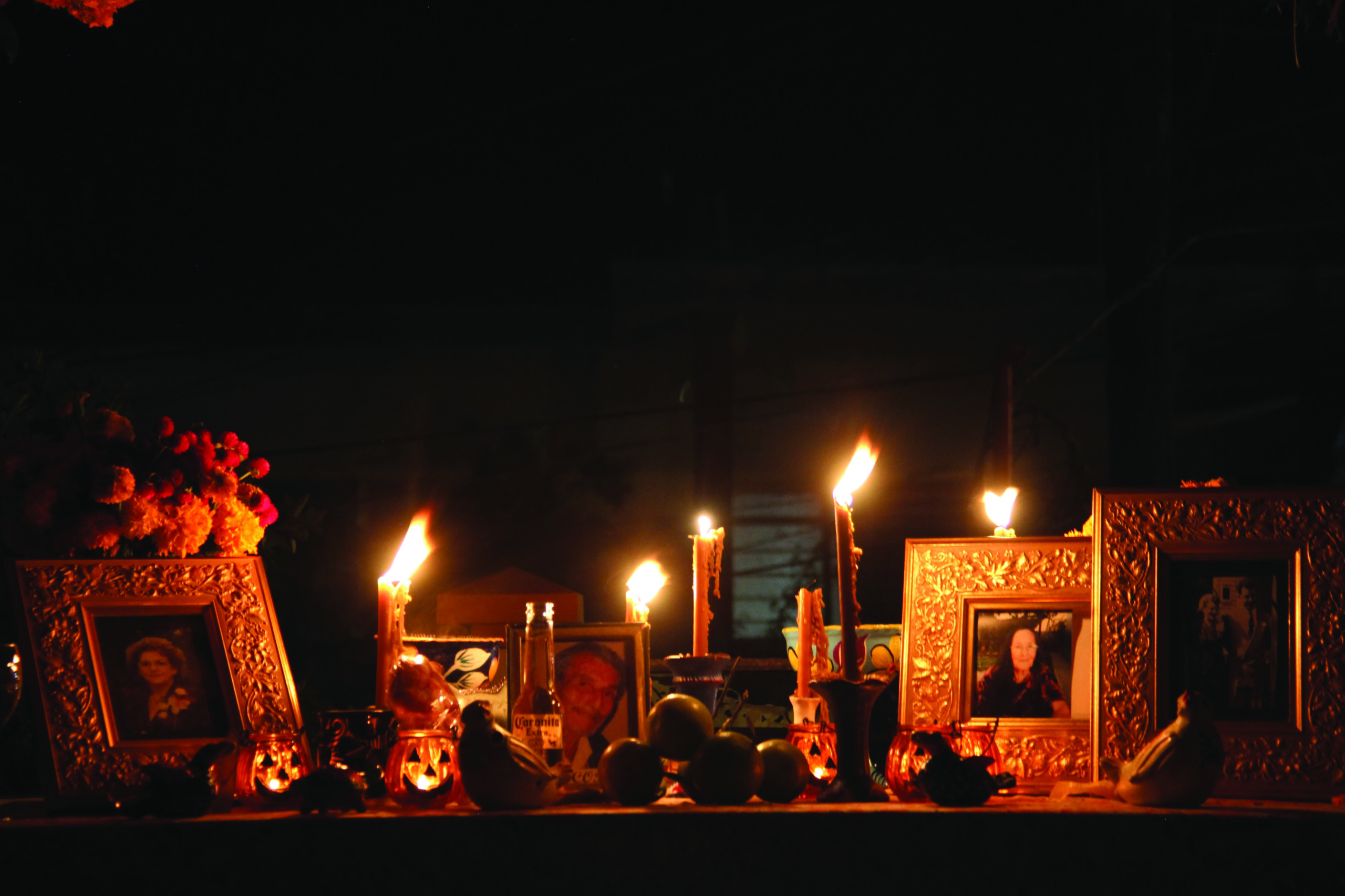 The altar that writer Nancy Fornasiero built with family and friends includes a photo of her mom (far left). (Photo: Nancy Fornasiero)