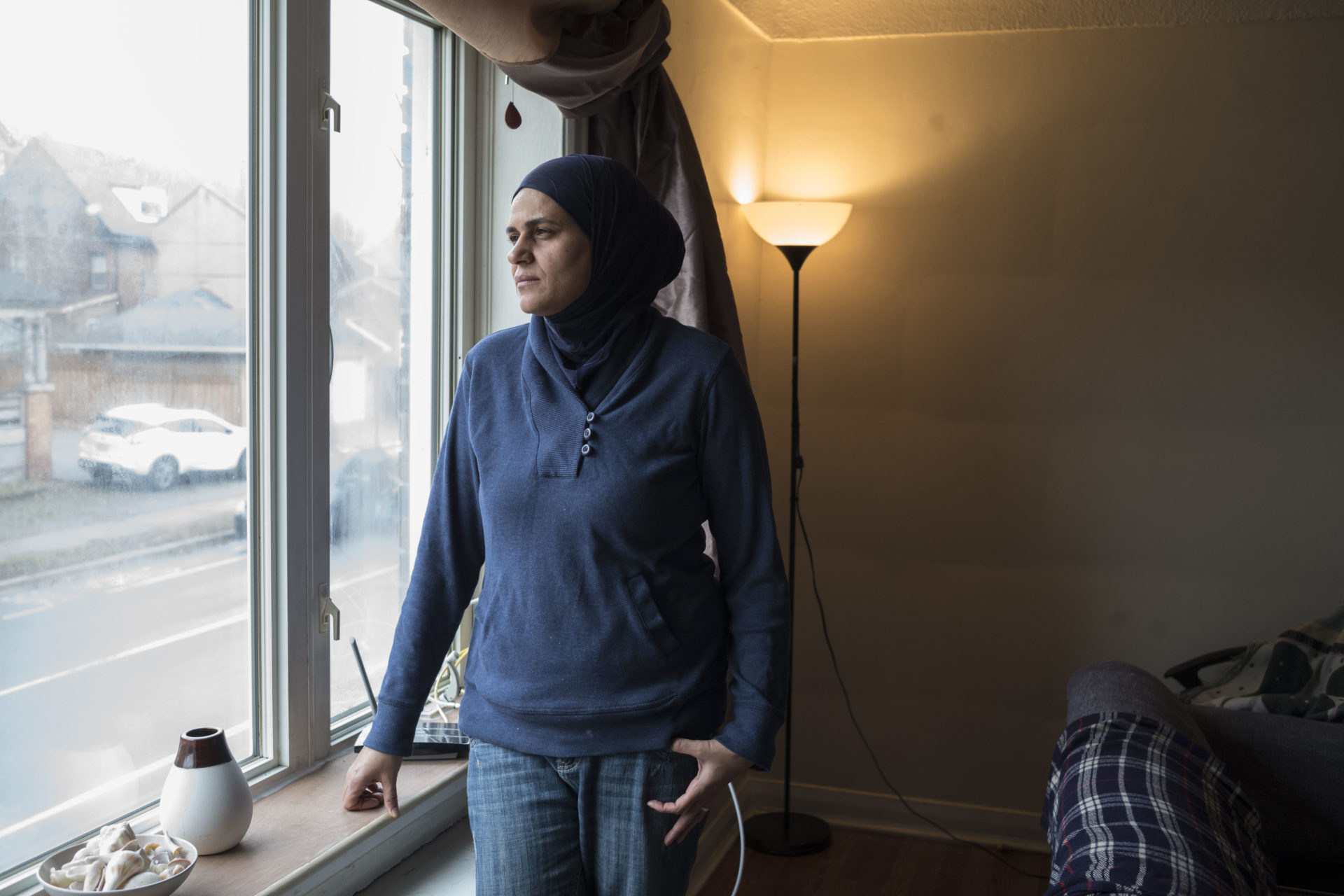 Mayson Al Misri at her new apartment in Hamilton, Ont. (Photo: Peter Bregg)