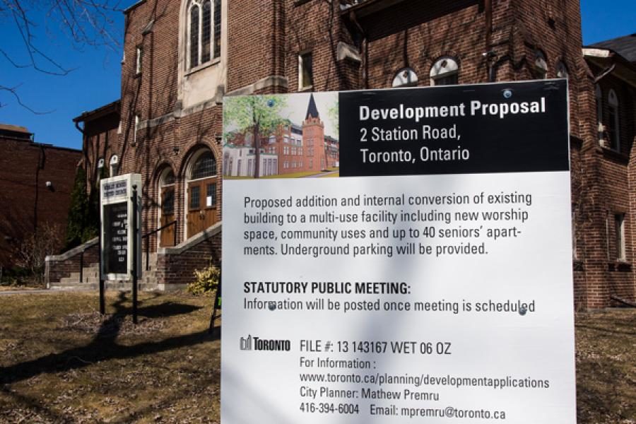 A development proposal sign at Wesley Mimico United in Toronto. Neighbours have been fighting the bid for five years. Photo courtesy of Peter Shepherd