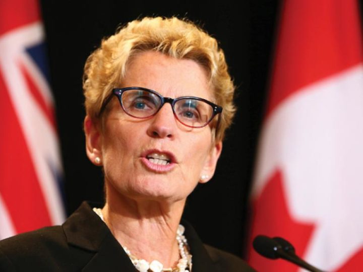 Ontario Premier Kathleen Wynne speaks at Queen's Park in Toronto in 2013. Photo by Dave Abel/Toronto Sun/QMI Agency