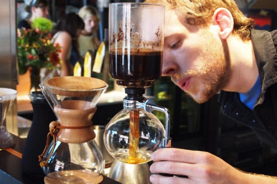 A Bridgehead barista brews a cup of coffee. Courtesy of Joelle Guedon