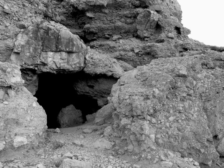 Some of the Dead Sea Scrolls were discovered in Cave 11, near the archaeological site of Qumran, in the West Bank. Photo courtesy of Wikimedia Commons