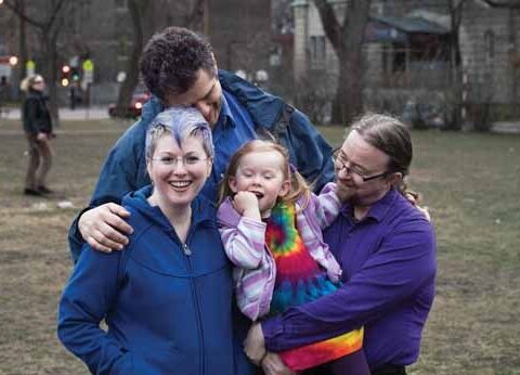 "Blue" Joyce, John Bashinski, Kaia Baird and Warren Baird at a park near their Montreal home. Photo by Neal Rockwell