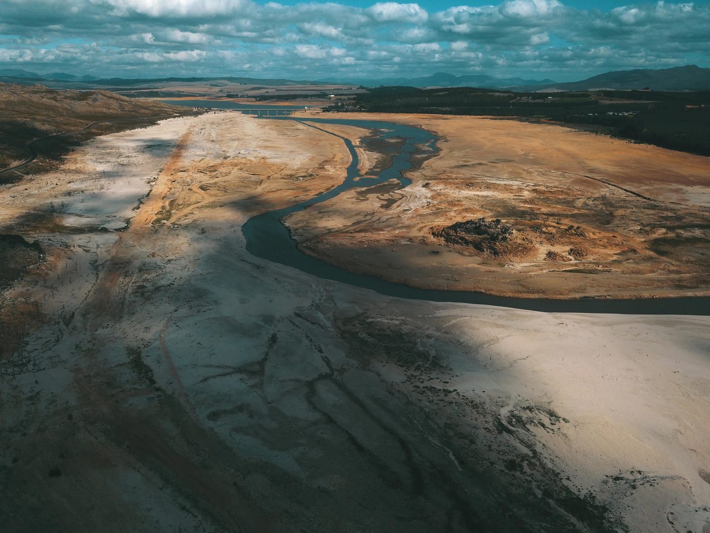 Theewaterskloof is the largest dam in the Western Cape Water Supply System, but it became more like a desert as rainfall declined in recent years and the population of Cape Town expanded rapidly. According to city officials, dam levels were at just 10 percent in March. Photo by Sydelle Willow Smith