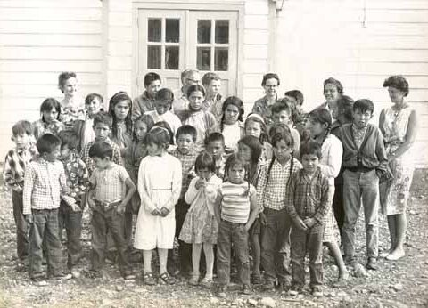 93.049P/792N, Teacher and class, Morley Indian Res School, circa 1930; United Church of Canada Archives.