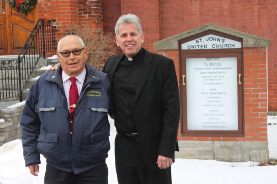 Retired fire chief Jim Grant (left) and minister Edward Murray helped launch a PTSD retreat at St. John’s United in Cardinal, Ont. Photo by Joe Martelle