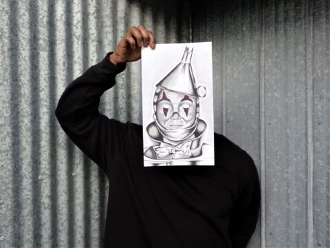 Man participating in William Head on Stage pictured with drawing