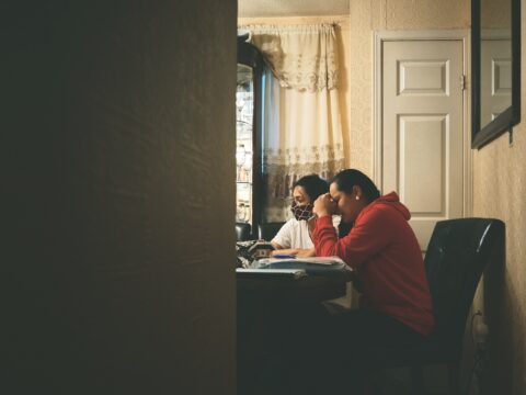 Family sitting at a table