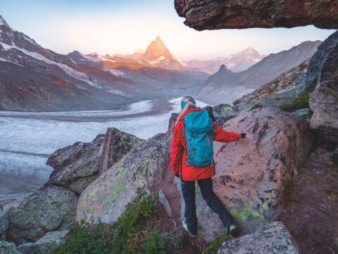 Hiking Girl Getting The View On Matterhorn And Swiss Glacier