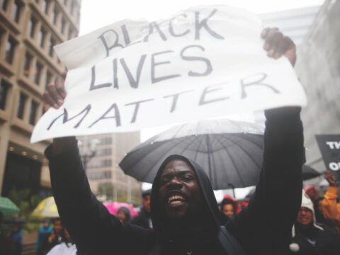 protester holding sign