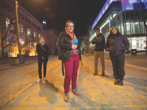 Young adults on street at night
