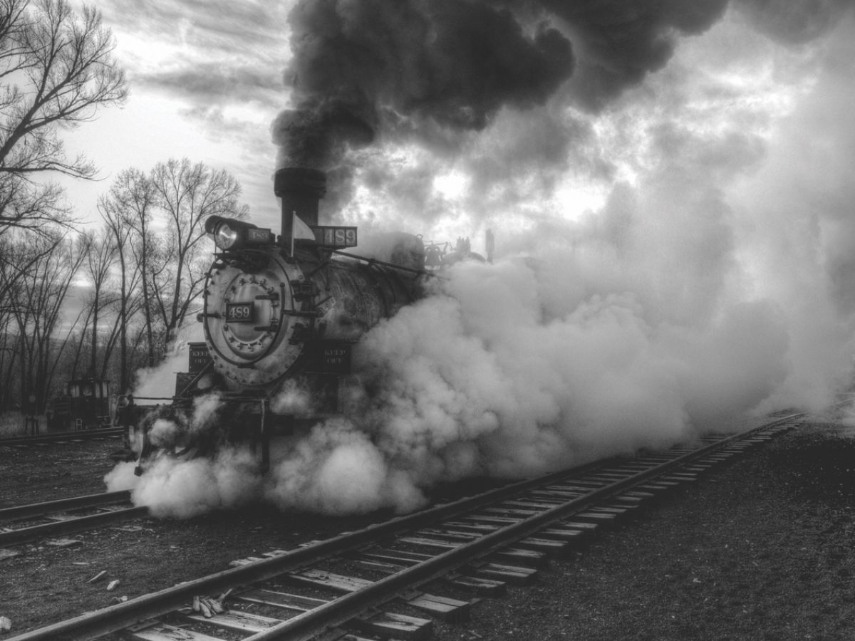 black and white photo of old steam engine