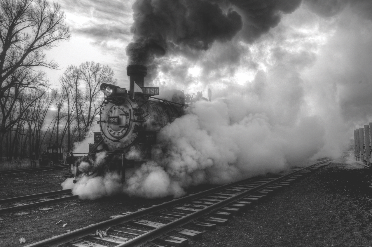black and white photo of old steam engine