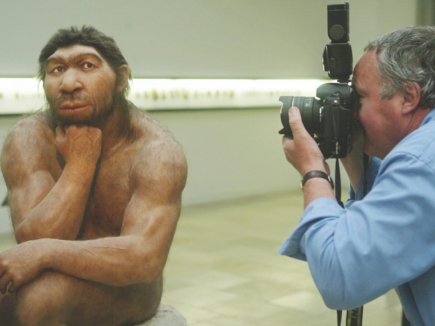 Man photographs Neanderthal figure