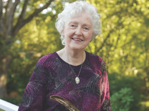 white-haired white woman in forest
