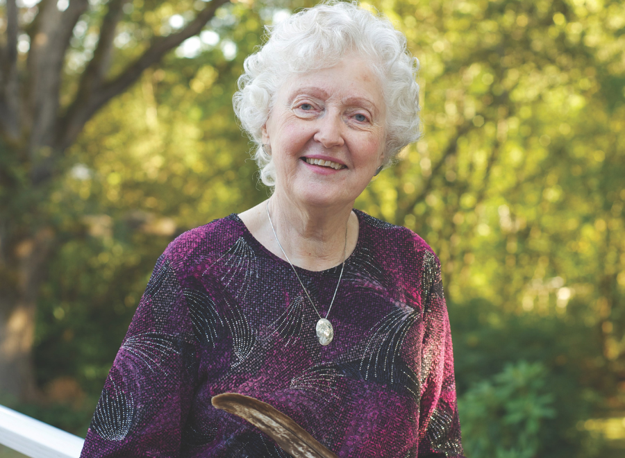 white-haired white woman in forest