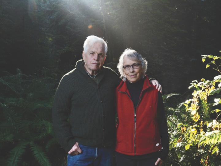 white-haired husband and wife in forest