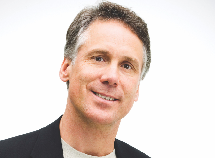 Grey-haired white man head shot